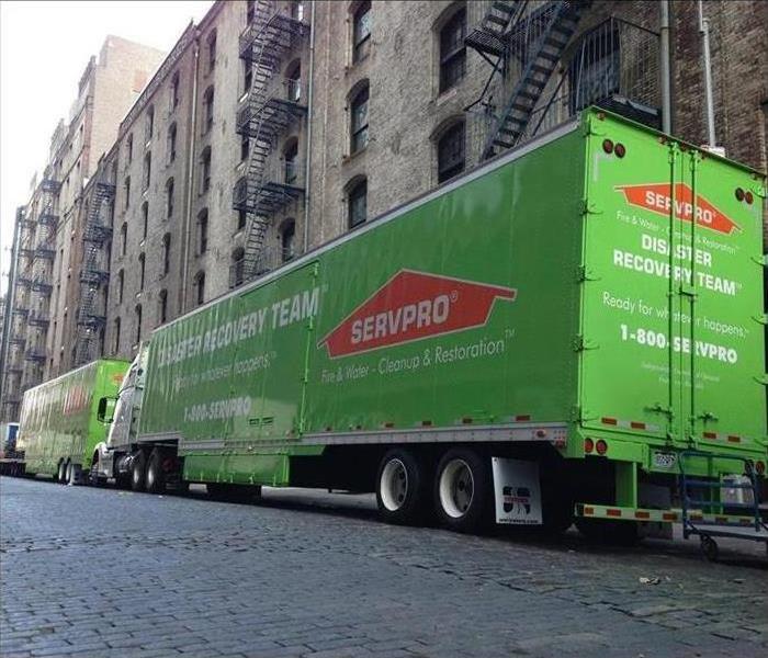 SERVPRO tractor trailer in front of a commercial building